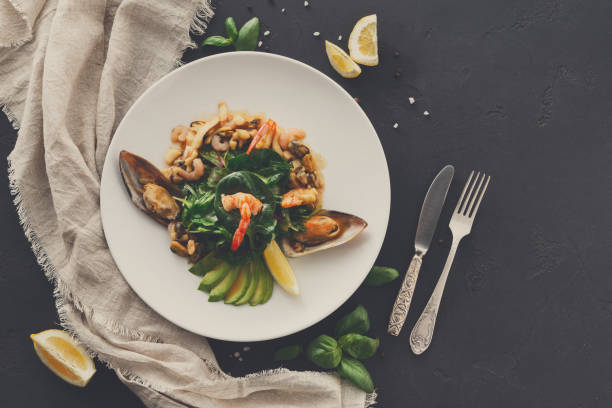 istock Warm salad with grilled seafood flat lay 871199096