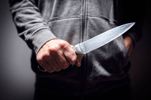 Knife crime Criminal with knife weapon threatening to stab murderer photos stock pictures, royalty-free photos & images