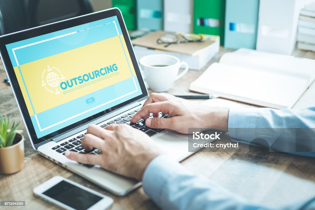 OUTSOURCING CONCEPT Outsourcing Stock Photo