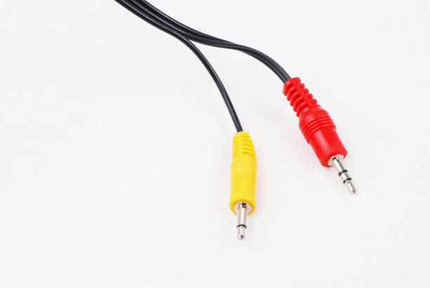 istock Red and yellow audio jacks on isolated white background 871204440