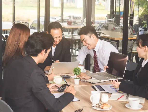 Meetings business young and smiling man/woman, discussing for financial report at meeting for business achievement and success