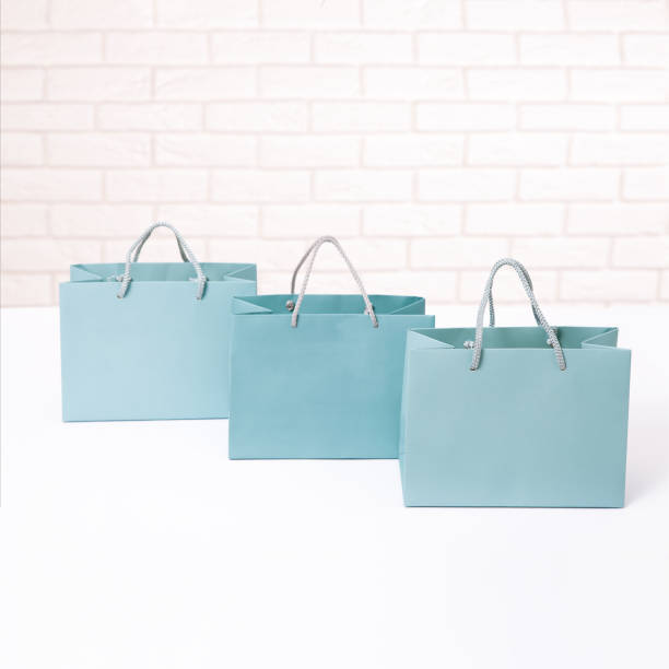 istock Paper shopping bag on white background. Close Up mock up for design 871212644