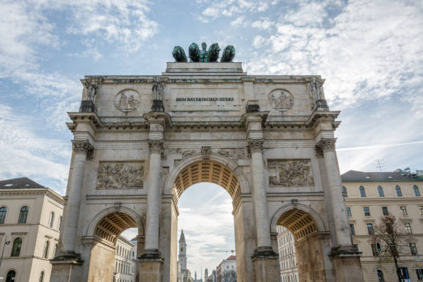 istock The Siegestor in Munich, Germany with the sun behind it 871217010