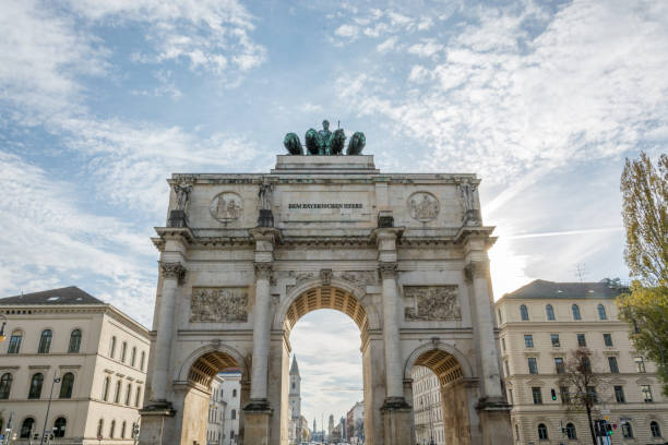 istock The Siegestor in Munich, Germany with the sun behind it 871217252