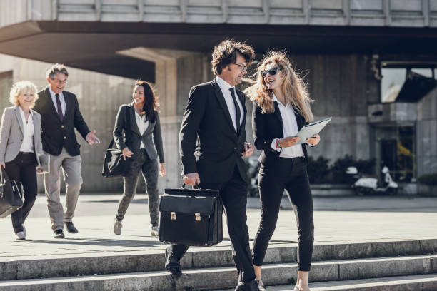 istock Business People Discussing in Front of Building 871217850
