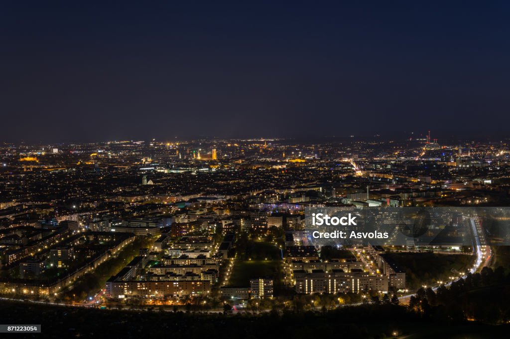Lights of Munich, Germany at night from the Olympic tower Above Stock Photo