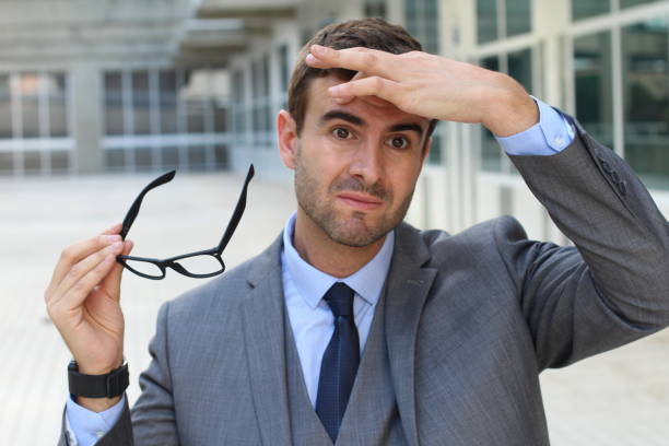 istock Exhausted businessman in office space 871223870