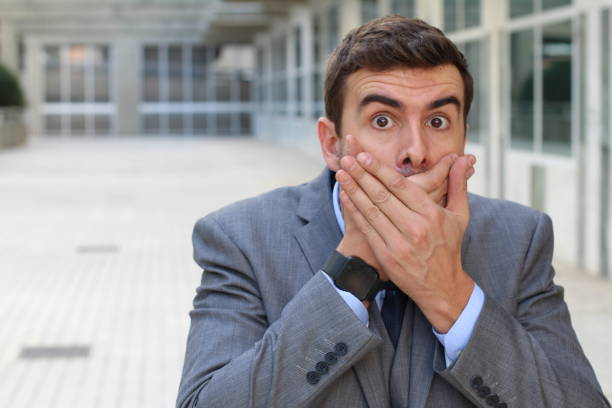 istock Nosy man reacting after getting a gossip 871223912