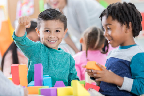 istock Little boy is grateful for playtime with friend at school 871226652