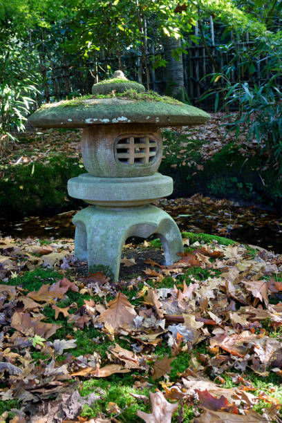 istock Traditional stone Japanese lantern in autumn 871231542