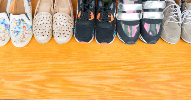 istock Shoes are placed on a wooden floor. 871235022