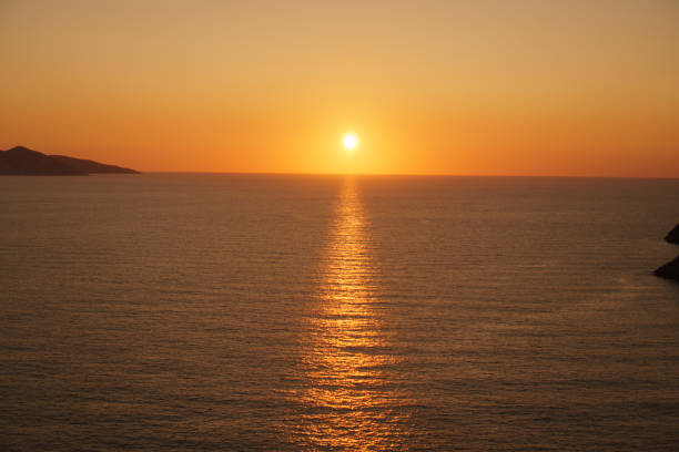 istock Bright sunset over the sea 871235686