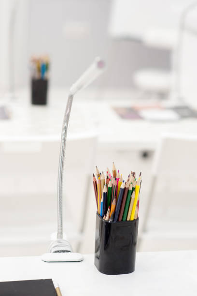 istock Many crayons with different colors. Back to school. Colored pencils in an glass 871238832