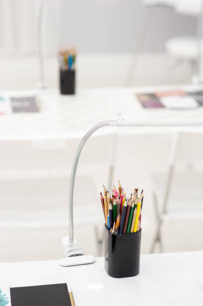 istock Many crayons with different colors. Back to school. Colored pencils in an glass 871238836