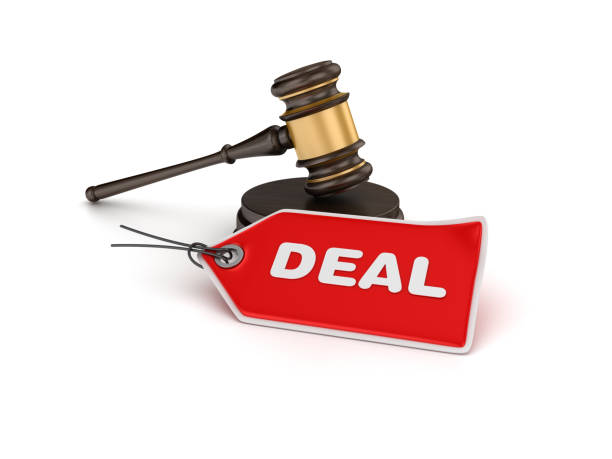 istock Gavel with Deal Tag - 3D Rendering 871242300