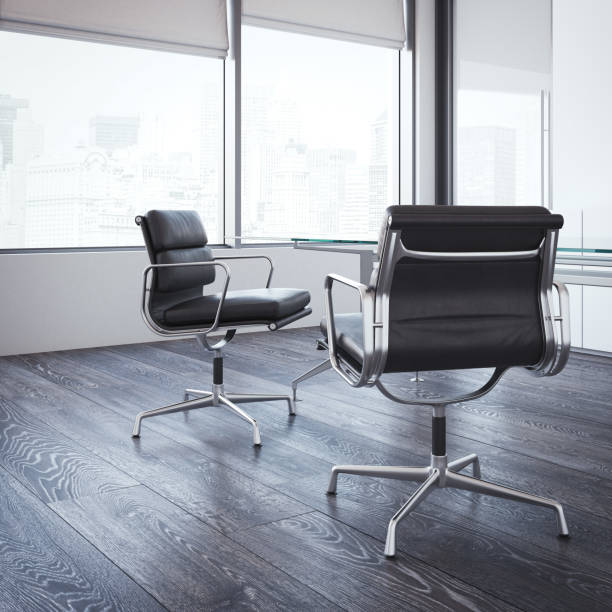 istock Two leather chairs in a modern office room. 3d rendering 871243920