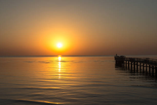 istock Dawn with the sea. Beach in Egypt 871244034