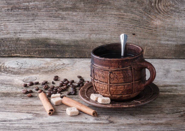 istock coffee in a big ceramic mug on a wooden Board 871251466