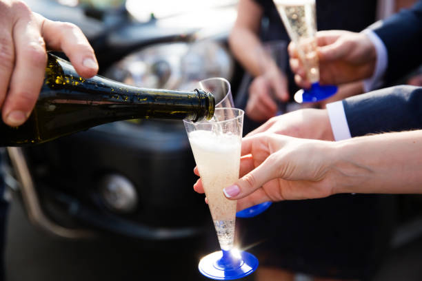 Pouring champagne into a glass