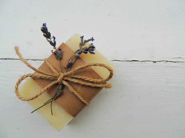 istock Handmade spa bath soap on vintage wooden background. 871255636