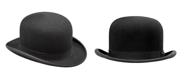 Two stylish black bowler hat isolated Two stylish black bowler hat isolated with clipping path bowler hat stock pictures, royalty-free photos & images