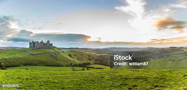 Countryside Panorama With Ruined Castle On A Hill At Sunset Stock Photo - Download Image Now