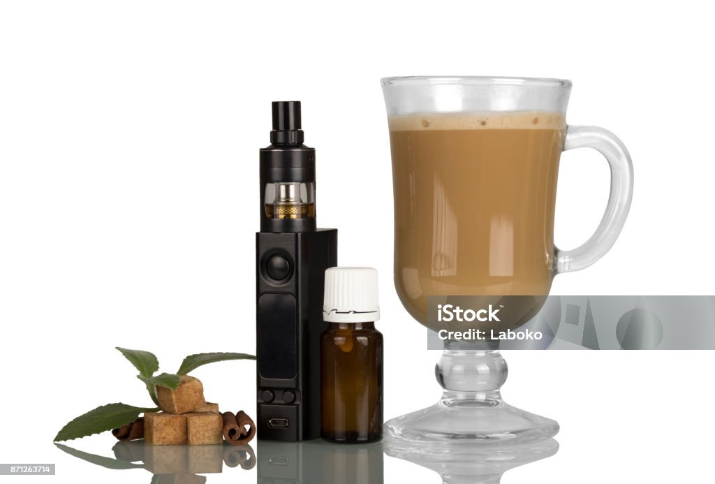 Cappuccino cup and electronic cigarette with aromatic liquid isolated on white Cappuccino cup and electronic cigarette with aromatic liquid isolated on white background Electronic Cigarette Stock Photo