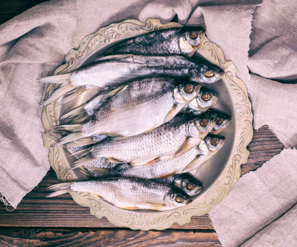 istock dried salted fish ram in an iron plate 871268530