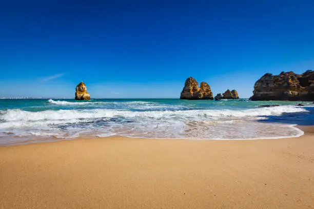 beautiful rocky beach near lagos, algarce coastline, portugal.