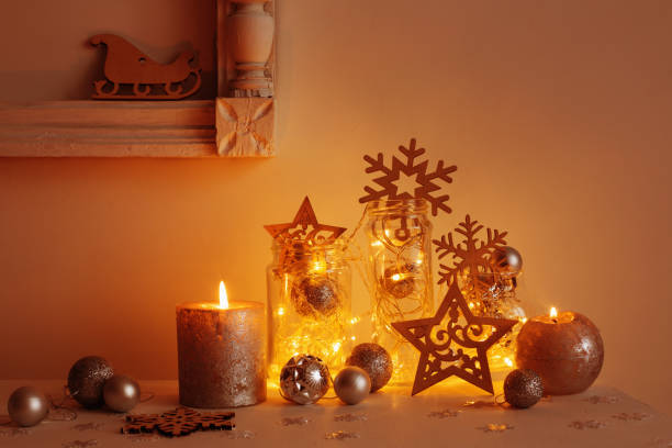 istock Christmas decoration with candles on background  white wall 871268992