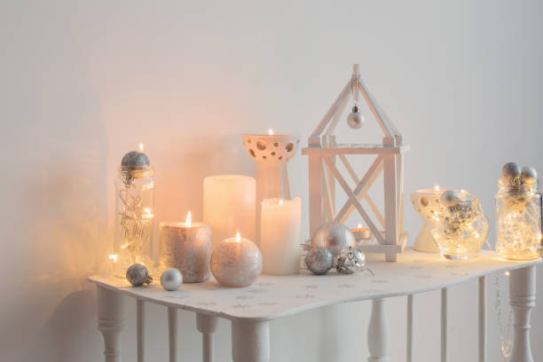 istock Christmas decoration with candles on background  white wall 871269000