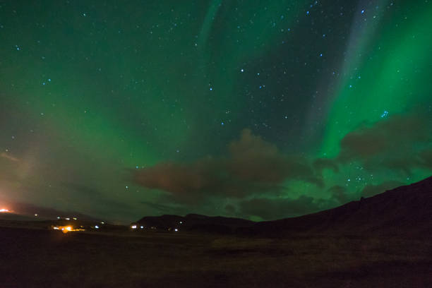 istock Northern lights Aurora Borealis above landscape in Iceland 871272242