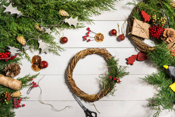 istock How to make christmas door wreath. The working process. The decorator's workplace. Top view 871272326
