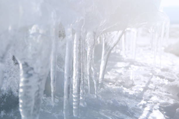 istock Ice with transparent icicles. Winter time at Lake Baikal 871273216