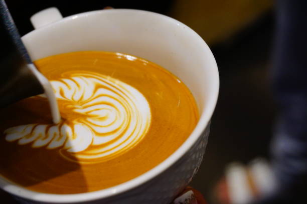istock Barista Pouring Latte Froth Art 871274452