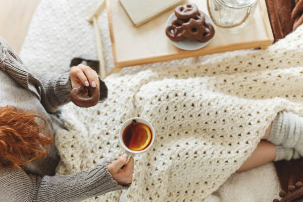 istock Woman having tea and gingerbread 871281072