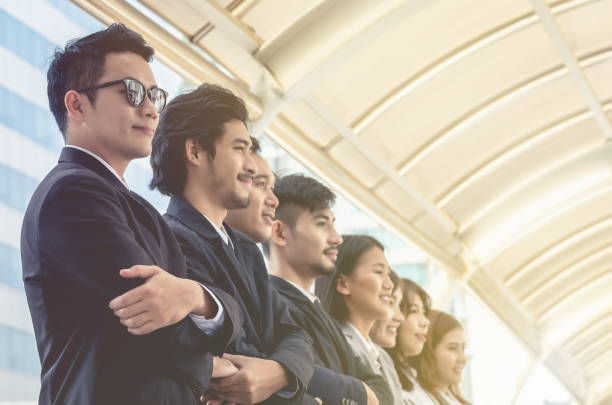 istock The young Asian business team stands with confidence and pride. 871285166