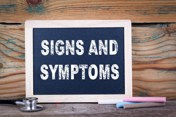 signs and symptoms. Chalkboard on a wooden background signs and symptoms. Chalkboard on a wooden background symptom photos stock pictures, royalty-free photos & images