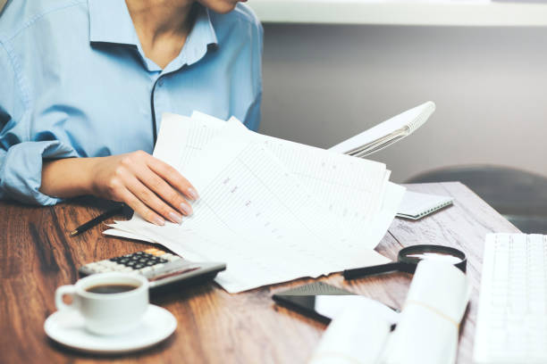 istock woman hand documents in the office 871300810