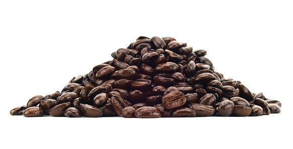 Isolated coffee bean pile on a white background.