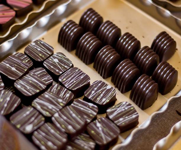 istock two types of chocolate pralines with stripes on surface 871308798