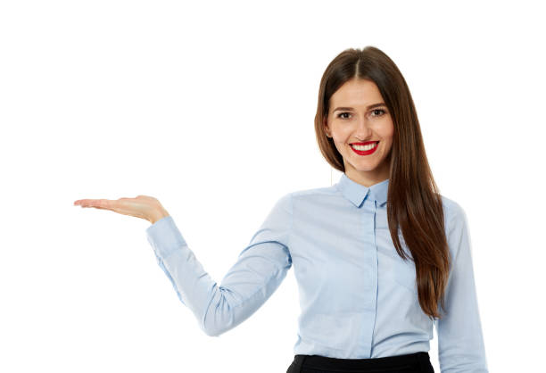 istock Businesswoman presenting a product 871311696
