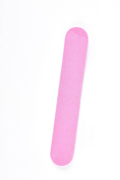 istock Pink nail file on a white background. 871323572