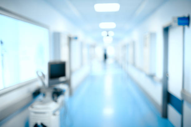 istock Blurred hospital hallway, unfocused background 871335540