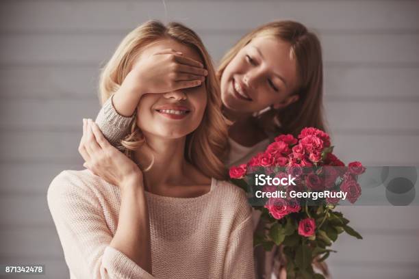 Mom And Daughter Stock Photo - Download Image Now - Mother, Party - Social Event, Flower