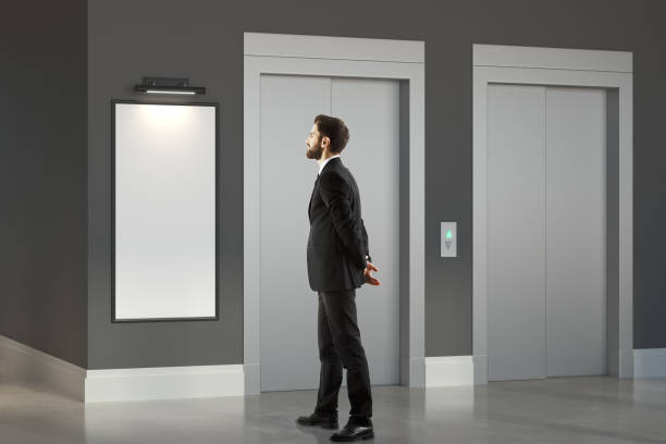 istock Thinking man in room with lift 871342636