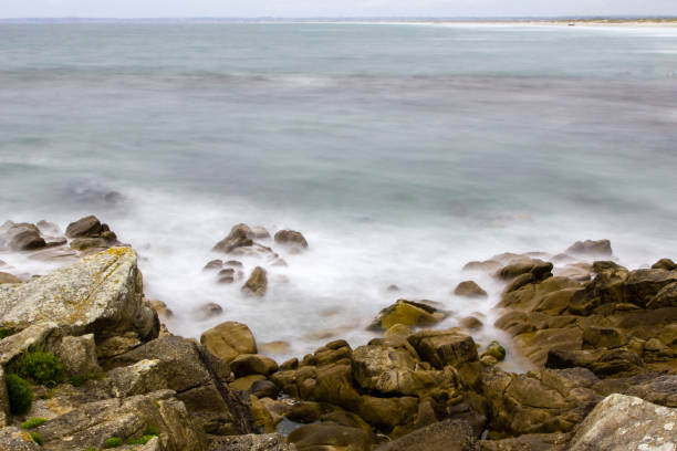 istock rocky coast at the Pointe de la Torche, in Brittany 871343368