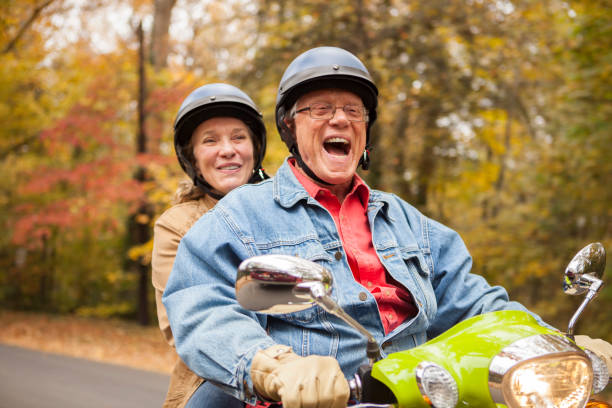 istock Happy Senior Couple on Scooter 871350114