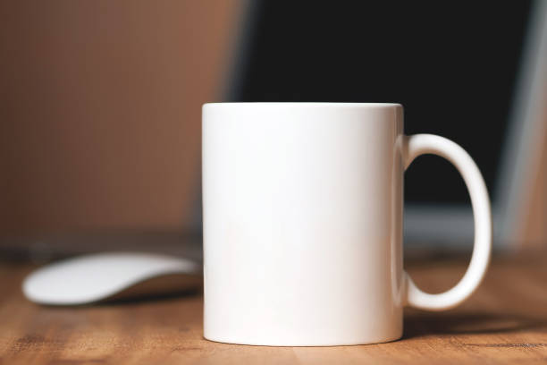White mug on the desktop White mug on the wooden table white mug on desk stock pictures, royalty-free photos & images