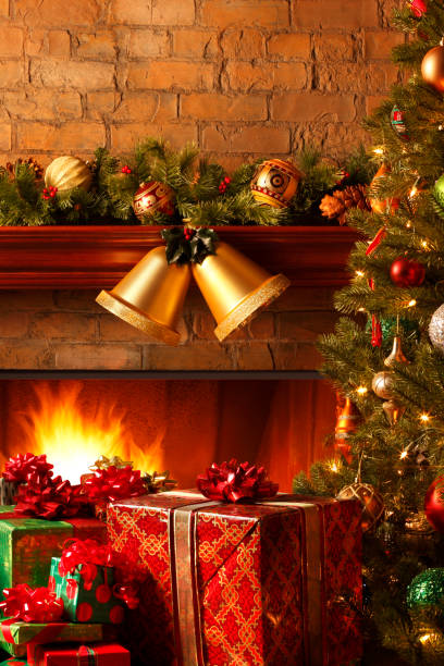 istock Christmas Tree And Presents In Front Of Fireplace 871354600